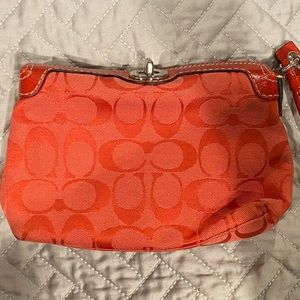 COACH Orange Wristlet With Silver Clasp